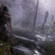 a woman paddles a kayak down a stream on a foggy night in hellblade senuas sacrifice on xbox game pass